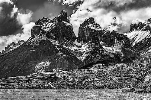 Black and white Large Pehoe Lake Lago Paine Horns three granite peaks-Torres del Paine National Par Art Print